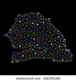 Bright mesh Senegal map with glare effect. Wire carcass polygonal mesh in vector format on a black background. Abstract 2d mesh designed with polygonal grid, points, colorful glare spots.