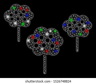 Bright mesh tree garden with glare effect. White wire frame triangular mesh in vector format on a black background. Abstract 2d mesh designed with polygonal grid, small circle, colored glare spots.