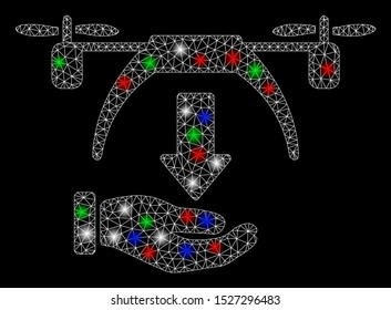 Bright mesh unload drone with glare effect. White wire frame triangular mesh in vector format on a black background. Abstract 2d mesh designed with triangular lines, round dots, colored flare spots.