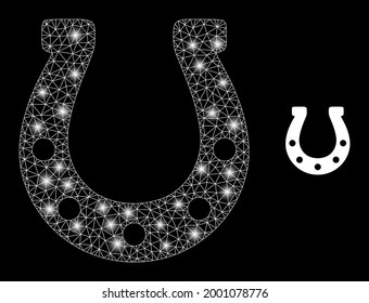 Bright mesh vector horseshoe with glare effect. White mesh, flash spots on a black background with horseshoe icon. Mesh and glare elements are placed on different layers.