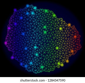 Bright mesh vector map of La Gomera Island with glare effect. Light spots have bright rainbow colors. Abstract lines, triangles, light spots on a dark background with map of La Gomera Island.