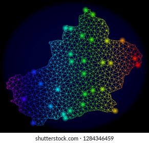 Bright mesh vector map of Xinjiang Uyghur Region with glare effect. Light spots have bright rainbow colors. Abstract lines, triangles,