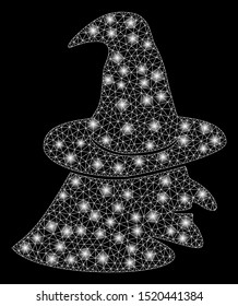 Bright mesh witch face with glare effect. Abstract illuminated model of witch face icon. Shiny wire carcass triangular mesh witch face. Vector abstraction on a black background.