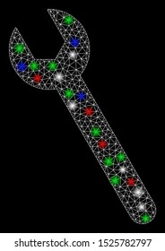 Bright mesh wrench with glare effect. White wire carcass polygonal mesh in vector format on a black background. Abstract 2d mesh designed with triangles, small circle, colored glare spots.