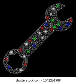 Bright mesh wrench with glow effect. White wire carcass polygonal network in vector format on a black background. Abstract 2d mesh designed with polygonal grid, dots, colored flash spots.