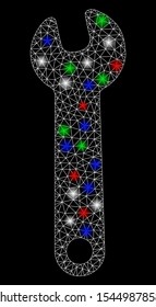 Bright mesh wrench with lightspot effect. White wire frame polygonal mesh in vector format on a black background. Abstract 2d mesh designed with polygonal grid, points, colorful flash spots.