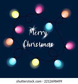 Bright multi colored Christmas light bulbs on a dark background