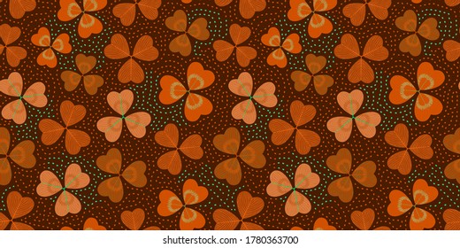 Bright multicolored seamless pattern with three-leaf clover. Repeat abstract botanical pattern. Vector illustration.