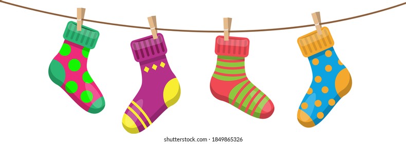bright multicolored socks with clothespins hang on a clothesline