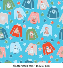 Bright multicolored vector seamless pattern with warm cozy winter sweaters with various cute prints: snowmen, animals, Christmas trees, snowflakes on a blue background. For design of covers, packages,