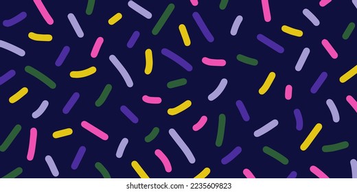Bright neon coloured confetti on dark blue background. Cute abstract horizontal backdrop. Multi colored decorative sprinkles. Pop art style textures. Vector design layout for banners presentations