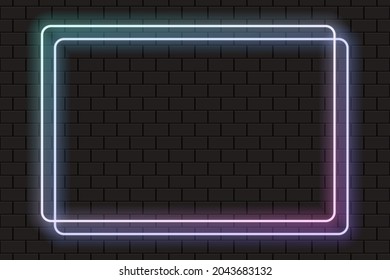 Bright neon double rectangle frame for banner or sign isolated on a dark brick wall.