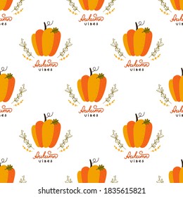 Bright orange pumpkin, doodle branches and hand drawn lettering "Autumn vibes". Vector seamless pattern. Simple cartoon flat style. Harvesting. Autumn backdrop for textile, wrapping paper, wallpaper.