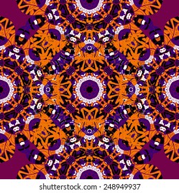 Bright orange and red seamless mandala pattern.