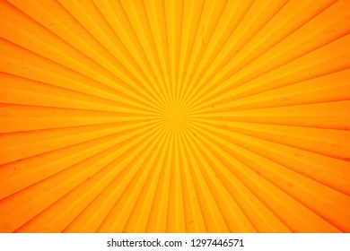 Bright orange and yellow rays background