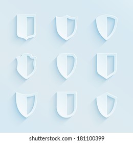 Bright paper simple coat of arms or shield vector icons set on gray background