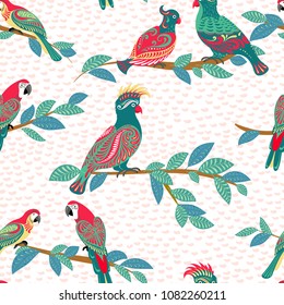 Bright parrots with ornaments sit on the branches. Seamless vector pattern with textured background.