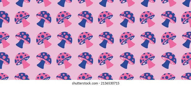 Bright pattern of red and purple mushrooms on a pink background. Magic mushrooms, toadstool.