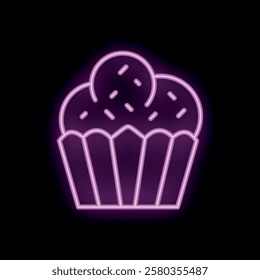 Bright pink neon sign showing a cupcake with sprinkles on black background