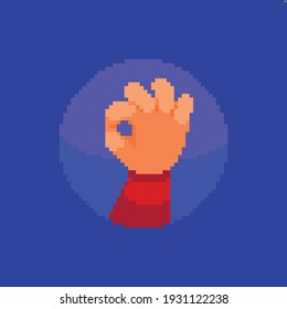 Bright pixel art hand showing ok gesture