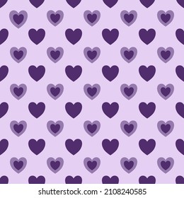 A bright purple background with a purple heart makes up the heart seamless design.