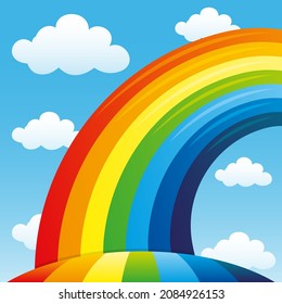 Bright rainbow and clouds in the blue sky.