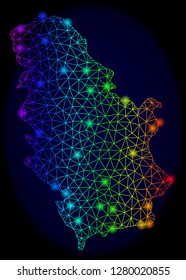 Bright rainbow mesh vector map of Serbia with glare effect. Abstract lines, triangles, glare spots forms map of Serbia on a dark background. Mesh and glowing elements are placed on different layers.