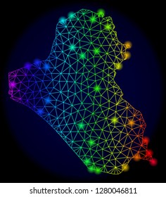 Bright rainbow mesh vector map of Iraq with glare effect. Abstract lines, triangles, light spots forms map of Iraq on a dark background. Mesh and glare elements are placed on different layers.