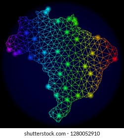 Bright rainbow mesh vector map of Brazil with glare effect. Abstract lines, triangles, light spots forms map of Brazil on a dark background. Mesh and glare elements are placed on different layers.
