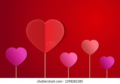 Bright Red background with hearts for wedding or for Valentine's day greeting card. A big paper heart and little hearts.