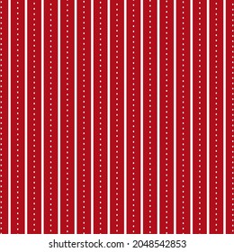 Bright red background with parallel lines and dots as seamless pattern for Christmas theme designs