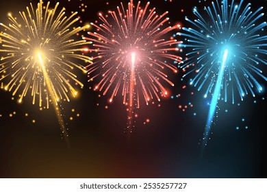 Bright red, blue, and yellow fireworks burst in a dark night sky. Celebration scene with glowing sparks