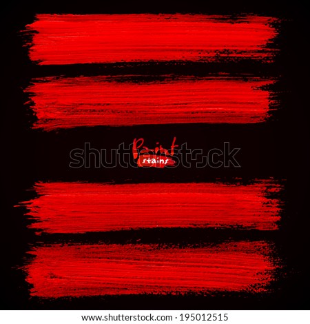 Bright red brush strokes on black background