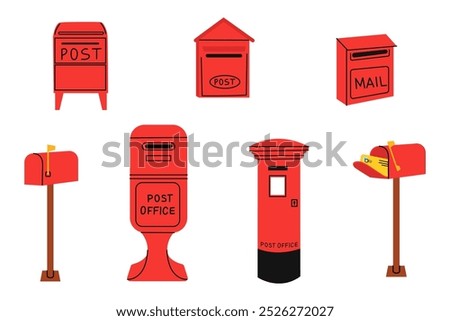 Bright red post office mailbox standing alone on a sidewalk in an urban area during daytime