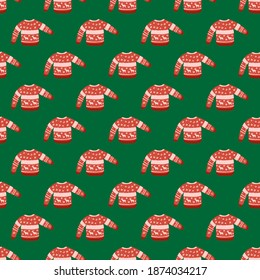 Luminoso patrón de navidad sin fisuras con adorno de suéter cálido. Ropa roja y acogedora sobre fondo verde. Impresión vectorial plana para textiles, tela, giftwrap, papel pintado. Ilustración sin fin.