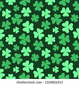 Bright seamless clover pattern for Saint Patrick's Day. Vector illustration on dark background 