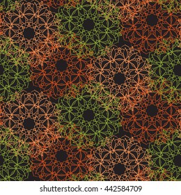Bright seamless lace pattern on a dark background. Style mandala pattern in vintage design