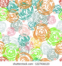 Bright seamless pattern. Circles painted by hand paint. Grunge texture. Vintage print for textiles. Vector illustration.