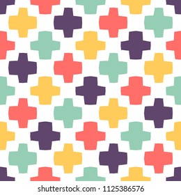 Bright seamless pattern with colorful geometric crosses.