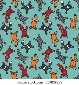 Bright seamless pattern with cute cartoon colorful cats on a green background. Beautiful illustration with funny kittens for use as a backdrop or as a print for fabric or wrapping.
