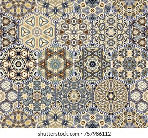Bright seamless pattern of hexagonal tiles with vintage ornament. Colorful vector set of elements for design of wallpaper, fabric or wrapping paper.