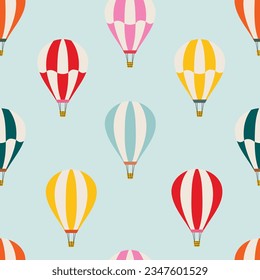 Bright seamless pattern with hot air balloons. Hand drawn balloon in the sky. Cute baby background. Funny decor for nursery, textiles, clothing, packaging, interior.