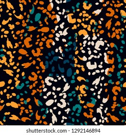 Bright seamless pattern with leopard print. Color leopard texture. Animal pattern.
