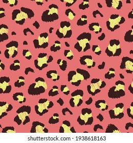 Bright seamless pattern with leopard print on a colored background. Vector illustration for printing on fabric, wallpaper, packaging paper, clothing. Cute baby background