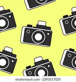 Bright seamless pattern minimalistic black and white camera on a yellow background. Doodle retro film camera, wrapping paper, background.