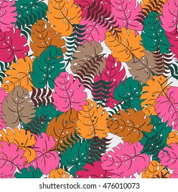 Bright seamless  pattern with palm branches and leaves  . Multicolor texture 