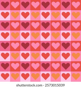 Bright seamless pattern in red and orange shades with hearts in squares. Checkered pattern in retro aesthetics
