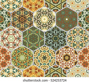 Bright seamless pattern tiles. Colorful vector set of hexagonal elements for design of wallpaper, fabric or wrapping paper.