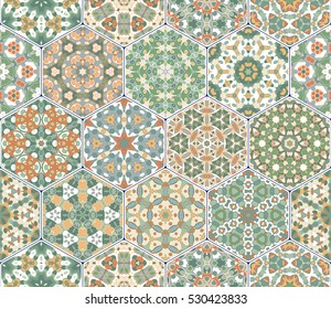 Bright seamless pattern tiles. Colorful vector set of hexagonal elements for design of wallpaper, fabric or wrapping paper.