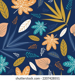bright seamless pattern with tropical leaves in yellow, orange, gold and blue on a juicy blue background